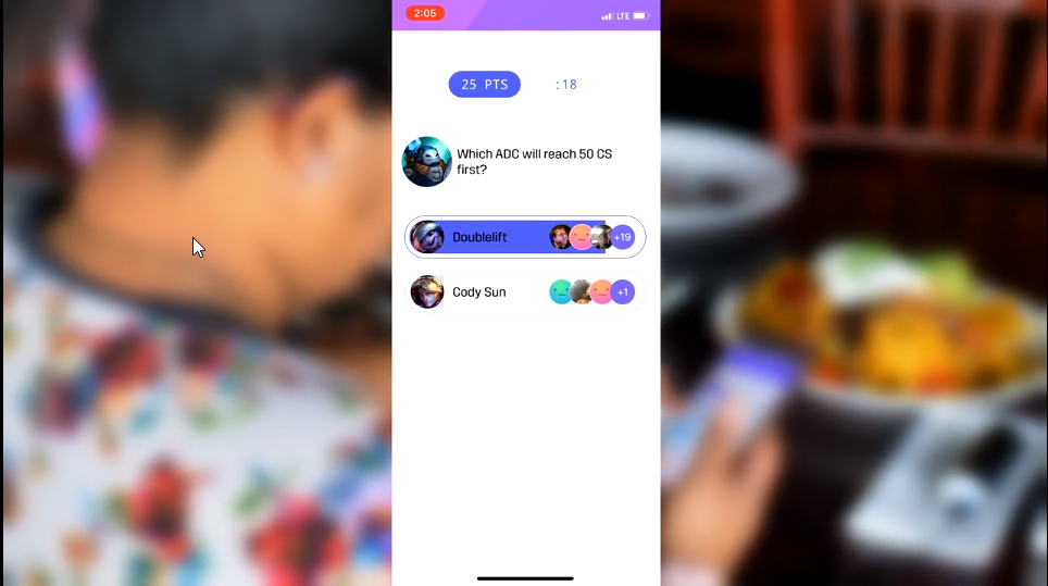 The rebranded Taunt app on a phone at a watch party.